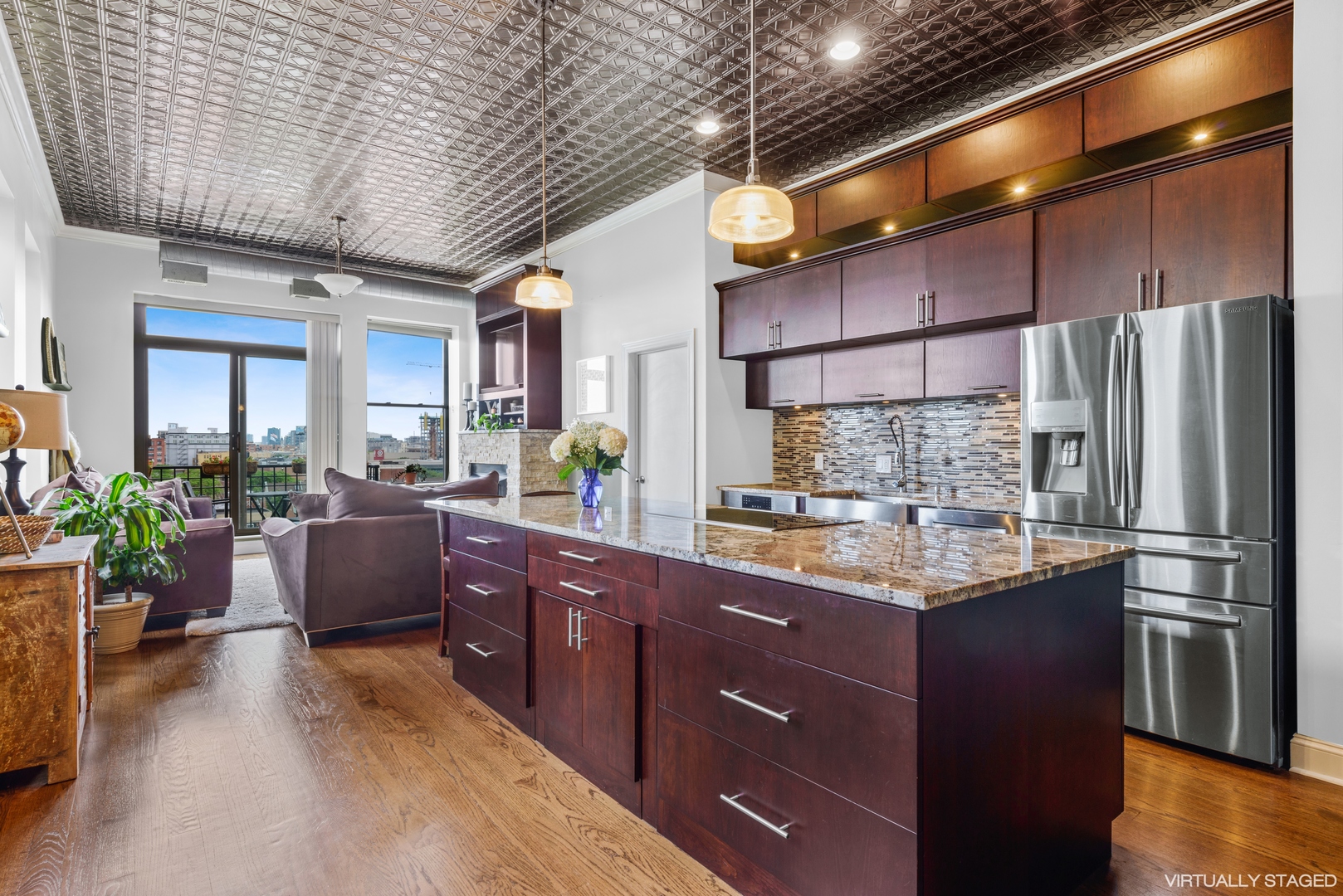 811 South Lytle Street, Unit 606 Chicago, IL 60607 - Photo 6 of 23 a kitchen with stainless steel appliances granite countertop a refrigerator a sink dishwasher a stove and white cabinets