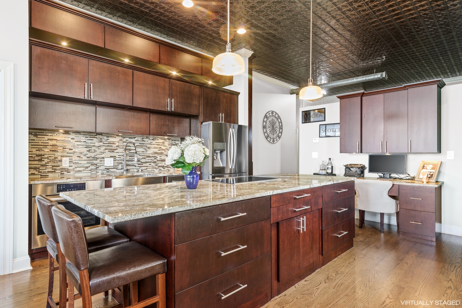 811 South Lytle Street, Unit 606 Chicago, IL 60607 - Photo 8 of 23 a kitchen with a sink cabinets and wooden floor