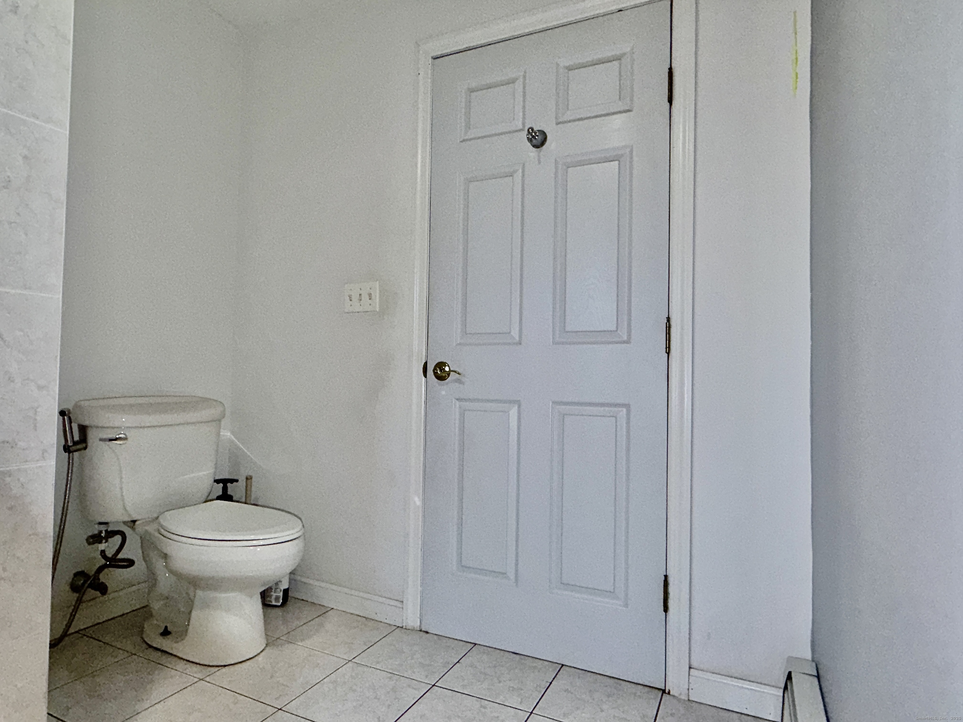 88 Rocky Rest Road Shelton, CT 06484 - Photo 14 of 21 a white toilet sitting next to a bathroom sink