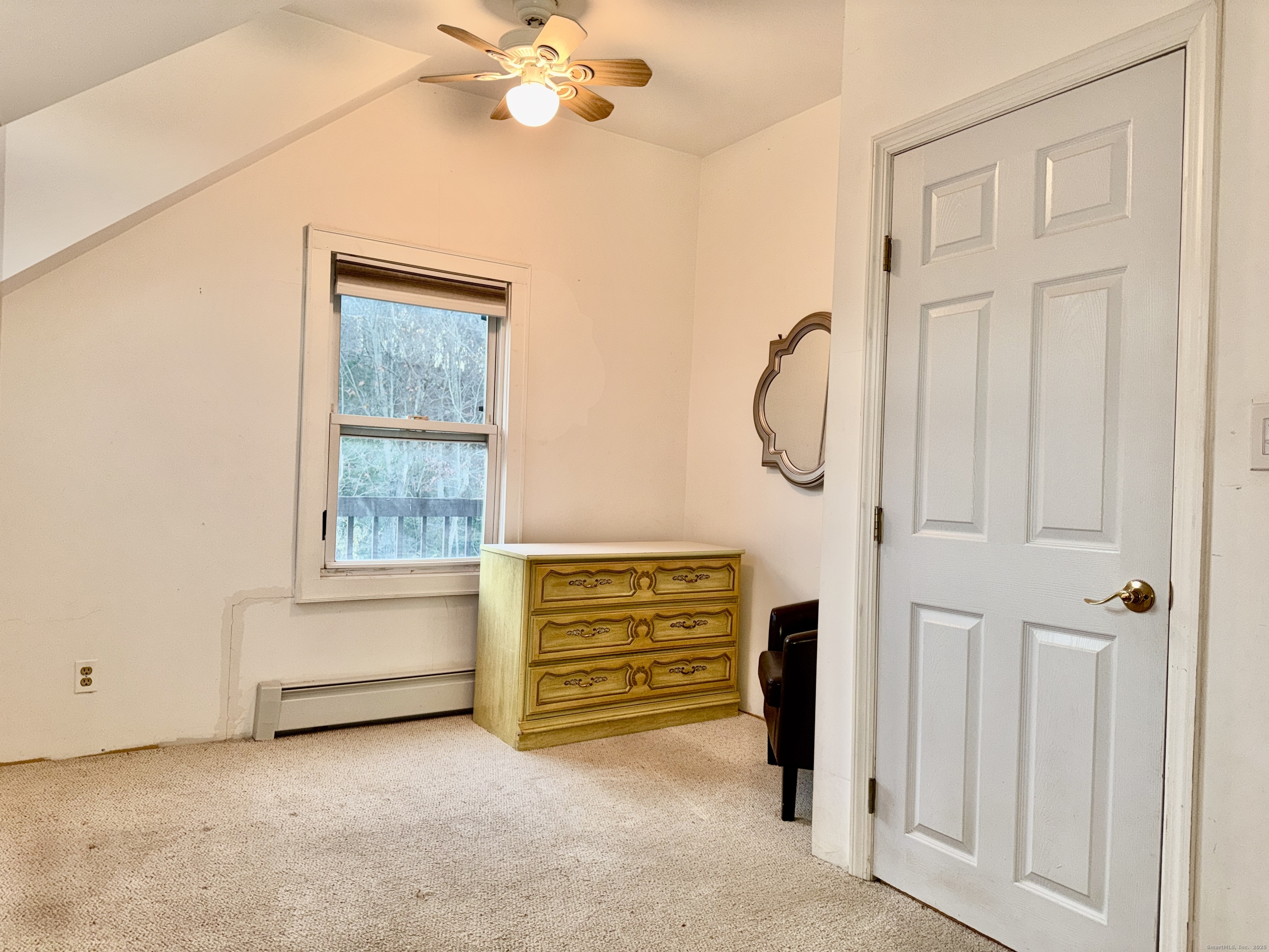 88 Rocky Rest Road Shelton, CT 06484 - Photo 16 of 21 an empty room with windows and closet