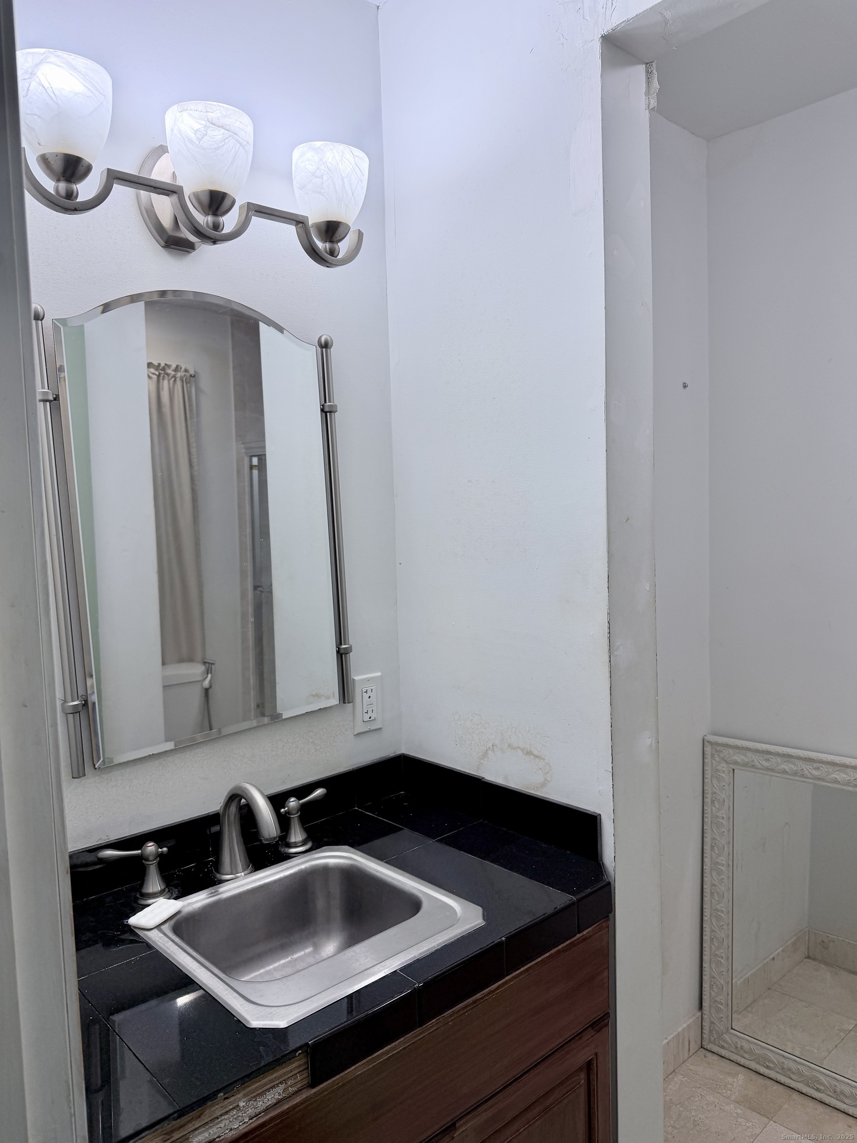 88 Rocky Rest Road Shelton, CT 06484 - Photo 8 of 21 a bathroom with a sink and a mirror