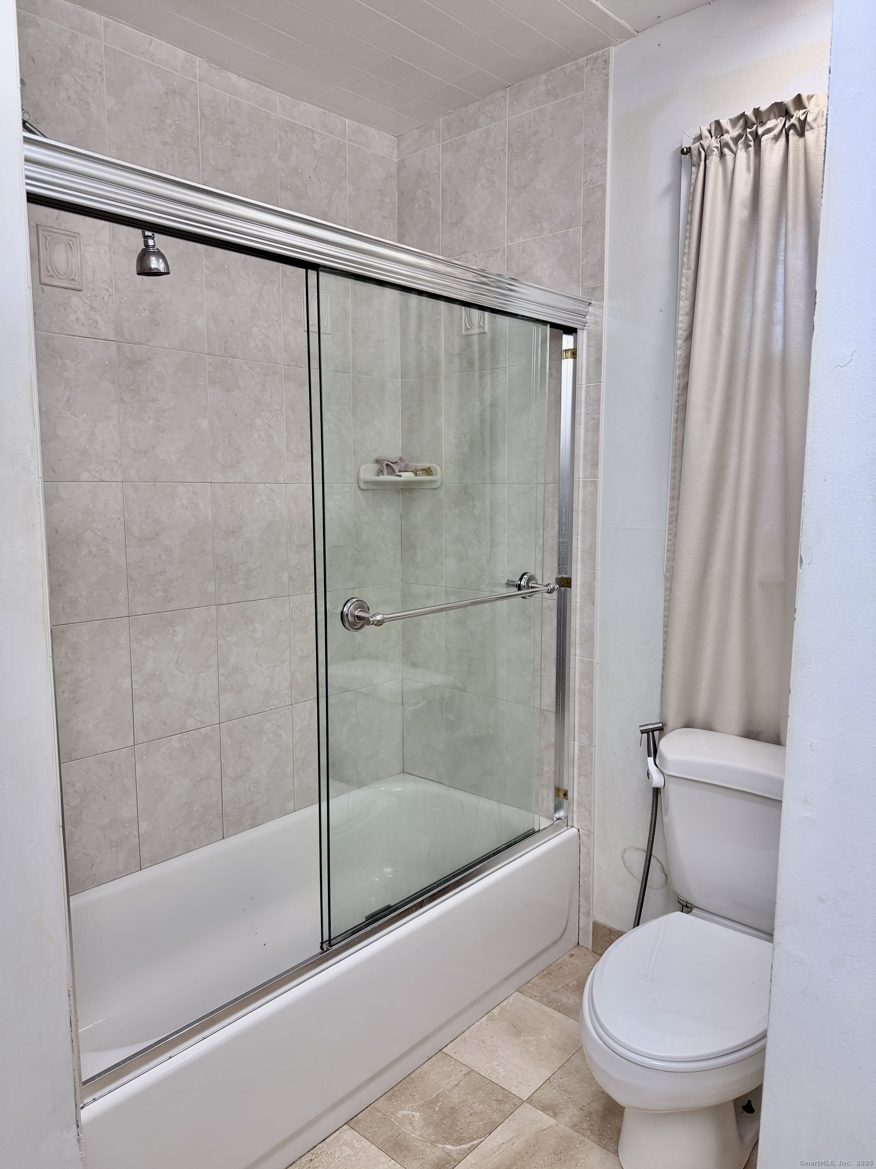 88 Rocky Rest Road Shelton, CT 06484 - Photo 9 of 21 a bathroom with a shower and a toilet