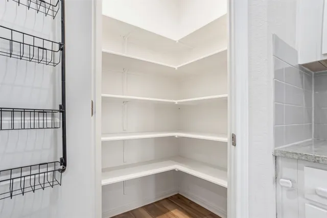 a empty closet with white paint