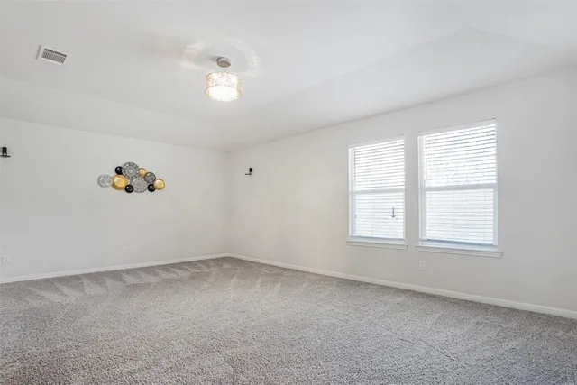 a view of a livingroom with an empty space and workspace