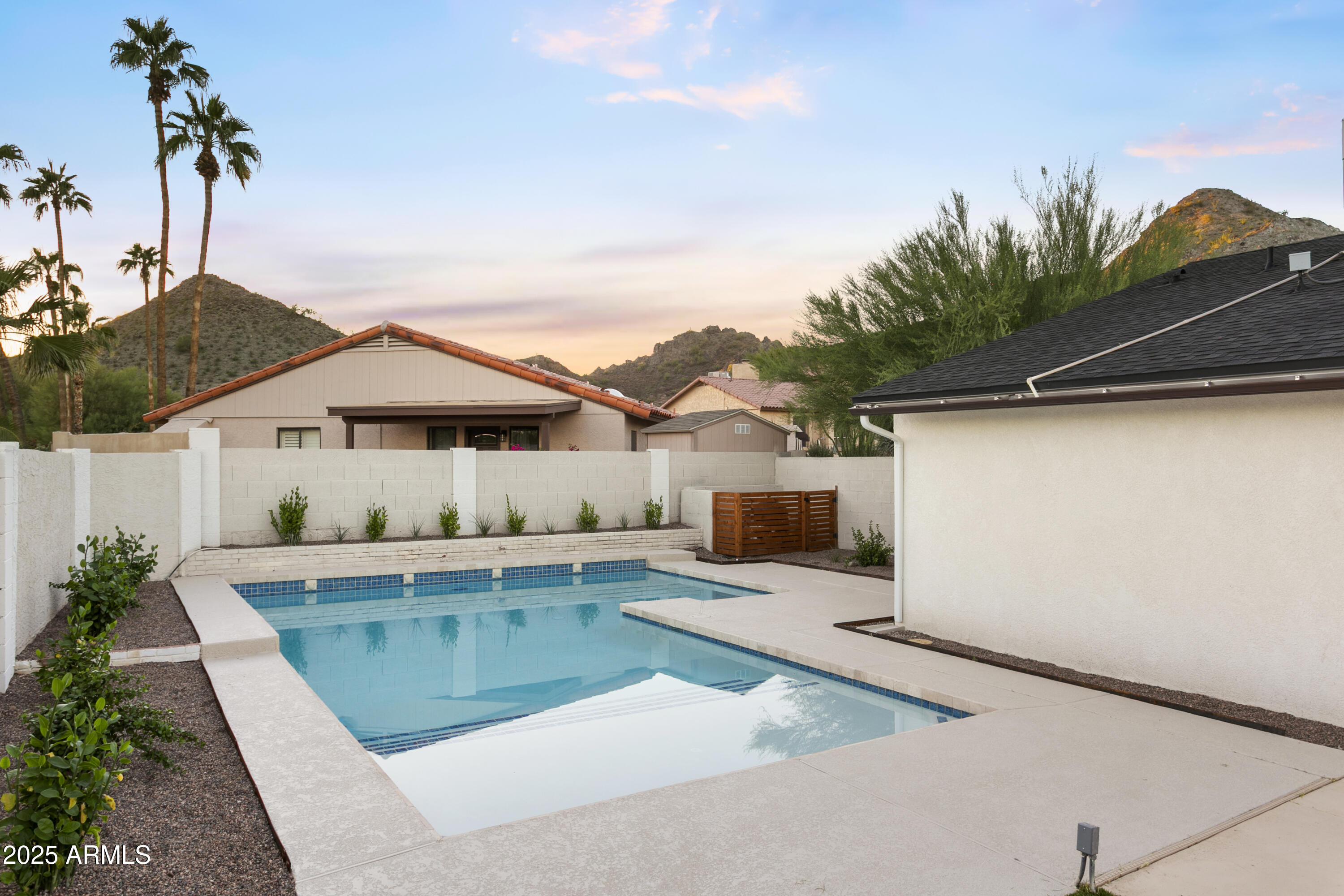 2273 East Clinton Street Phoenix, AZ 85028 - Photo 27 of 30 a front view of house with yard outdoor seating and barbeque oven
