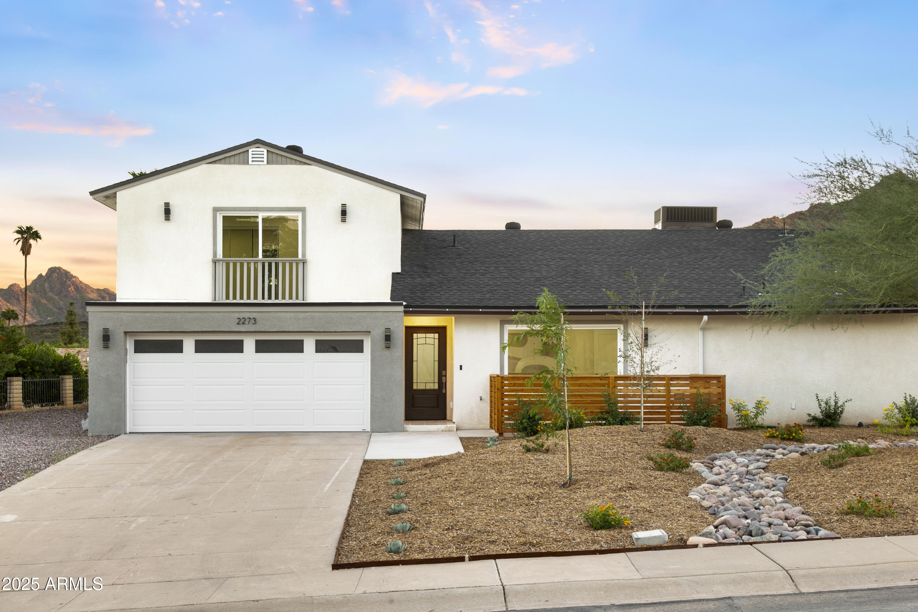 2273 East Clinton Street Phoenix, AZ 85028 - Photo 30 of 30 a front view of a house with garage