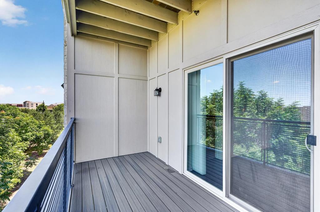 651 Watters Road, Unit 5305 Allen, TX 75013 - Photo 12 of 40 a view of a balcony with wooden floor and outdoor space