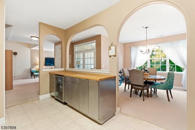 a view of a dining room with furniture window and outside view