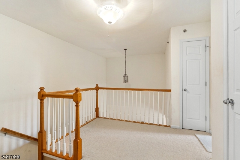 106 Limerick Lane Phillipsburg, NJ 08865 - Photo 19 of 23 a view of a hallway with staircase