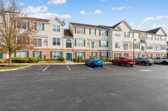a view of a street with cars