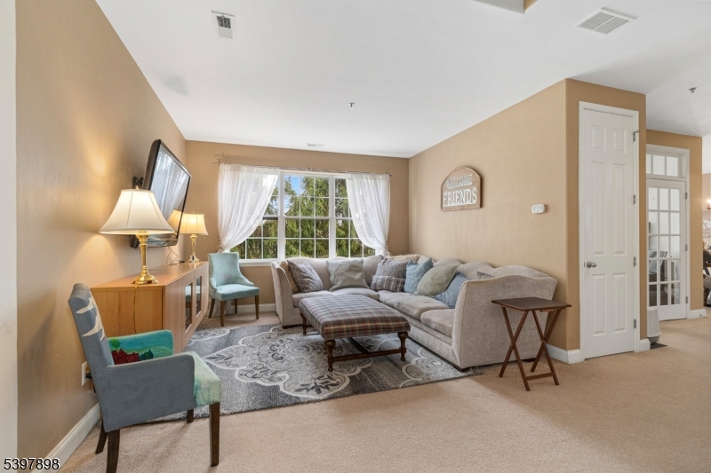 106 Limerick Lane Phillipsburg, NJ 08865 - Photo 3 of 23 a living room with furniture and a large window