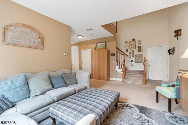 a living room with furniture and a couch