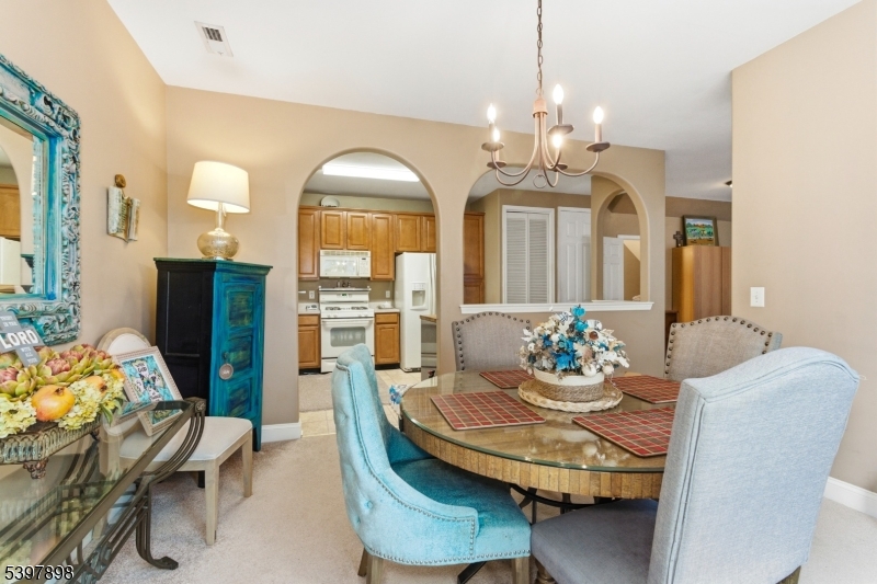 106 Limerick Lane Phillipsburg, NJ 08865 - Photo 8 of 23 a view of a dining room with furniture and chandelier