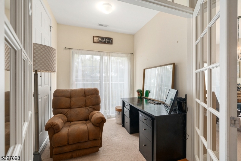 106 Limerick Lane Phillipsburg, NJ 08865 - Photo 9 of 23 a living room with furniture and a window