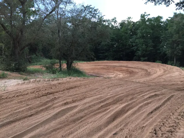 a view of a backyard of the house