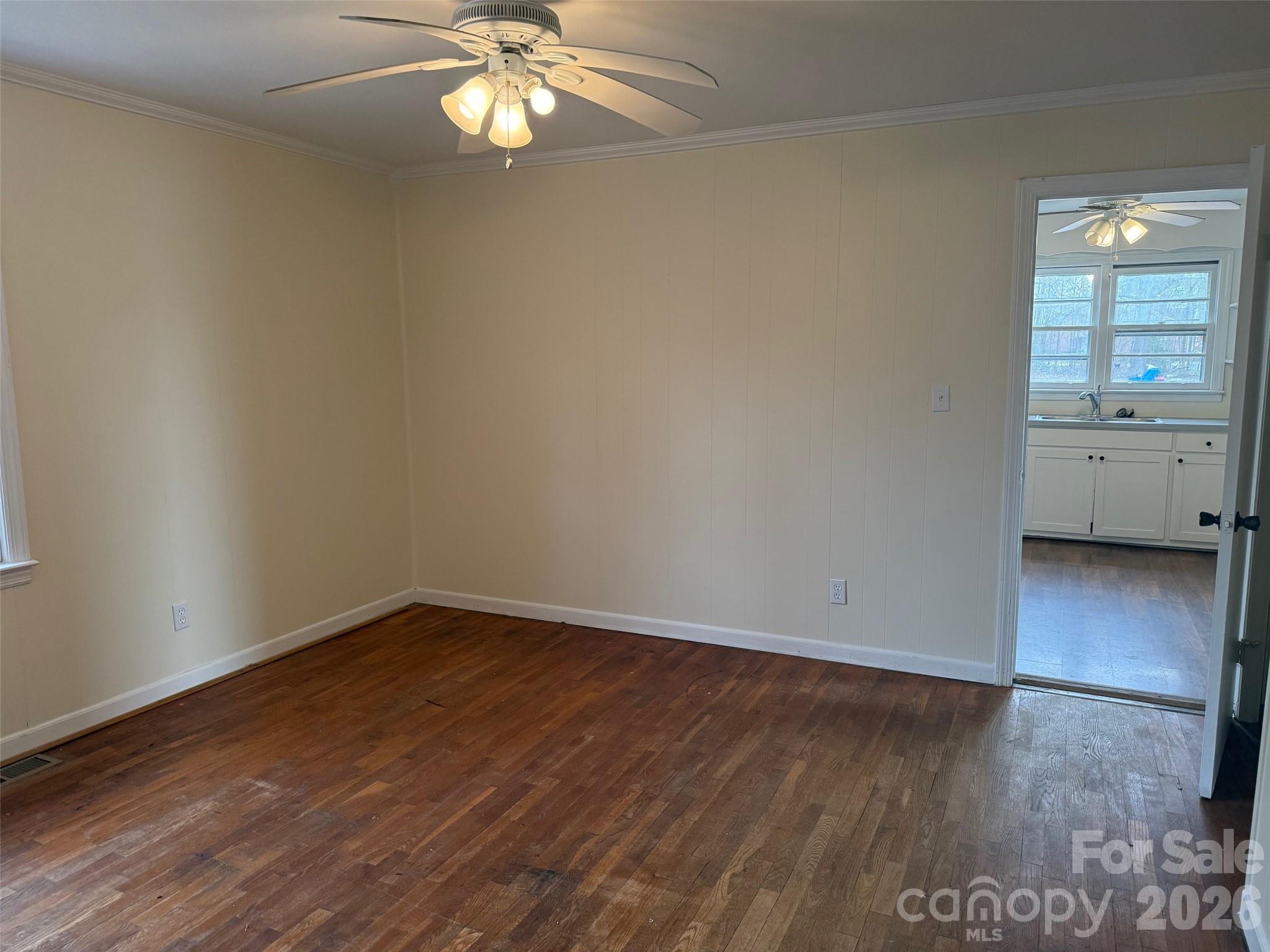 292 Youngs Bend Road Kershaw, SC 29067 - Photo 15 of 18 a view of an empty room with window and wooden floor