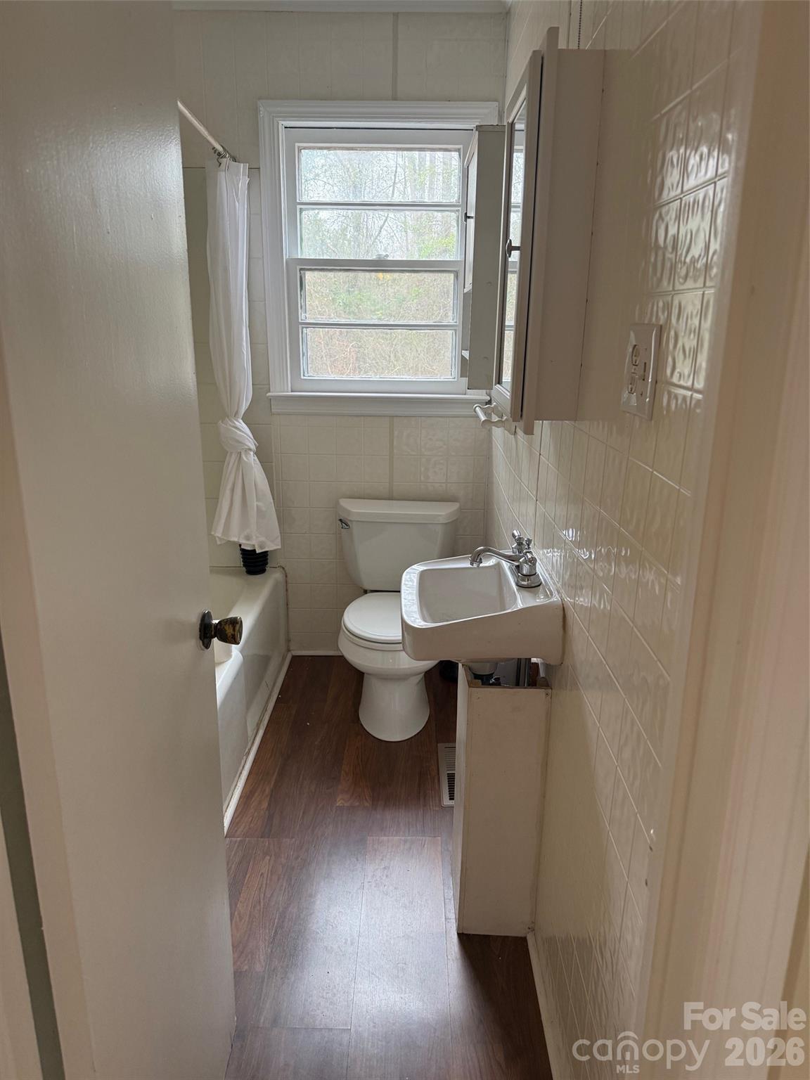 292 Youngs Bend Road Kershaw, SC 29067 - Photo 18 of 18 a bathroom with a sink a toilet and a window