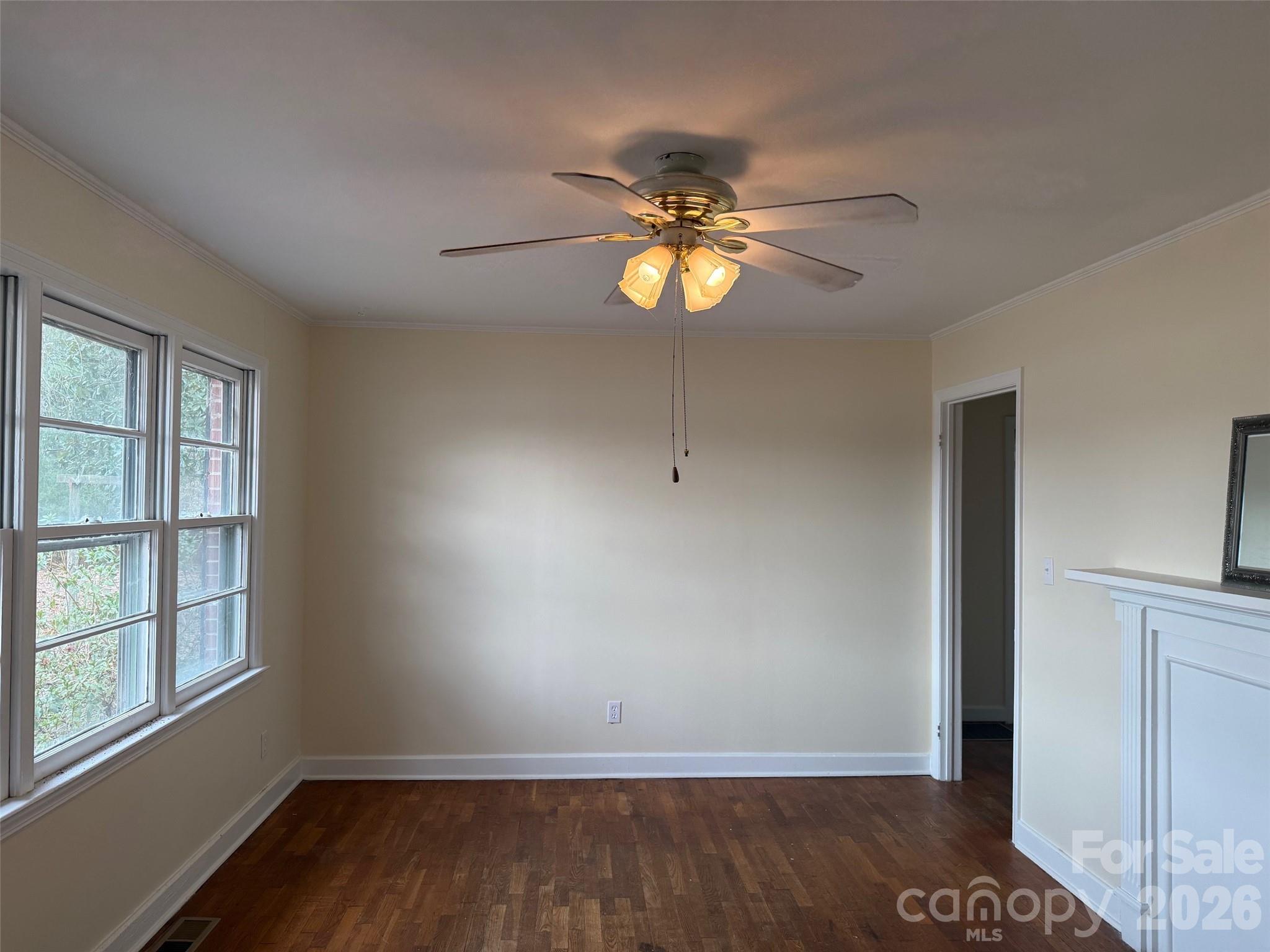 292 Youngs Bend Road Kershaw, SC 29067 - Photo 10 of 18 wooden floor in an empty room with a window