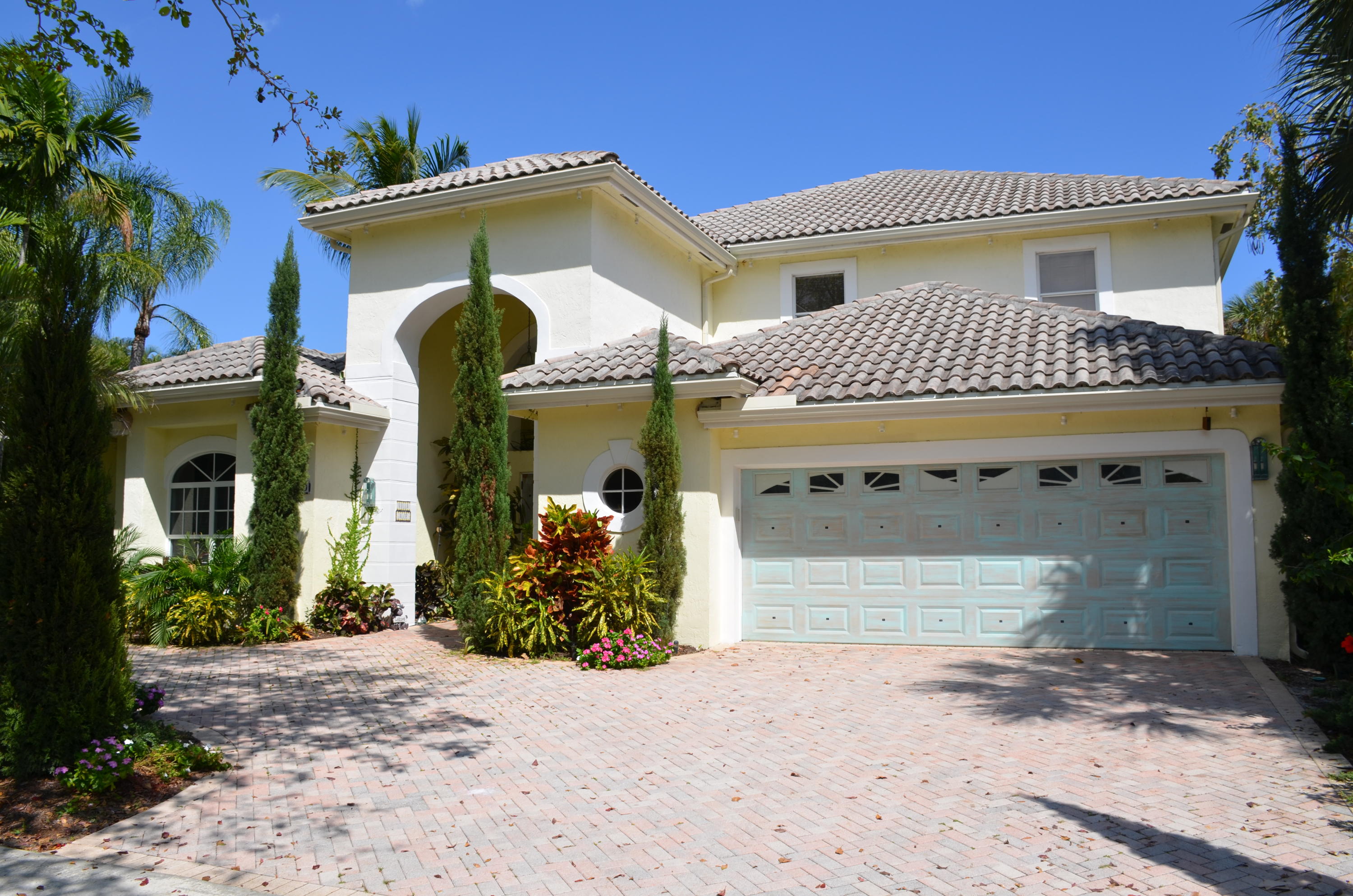 1200 Parkside Avenue Boca Raton, FL 33486 - Photo 1 of 33 a front view of a house with garden