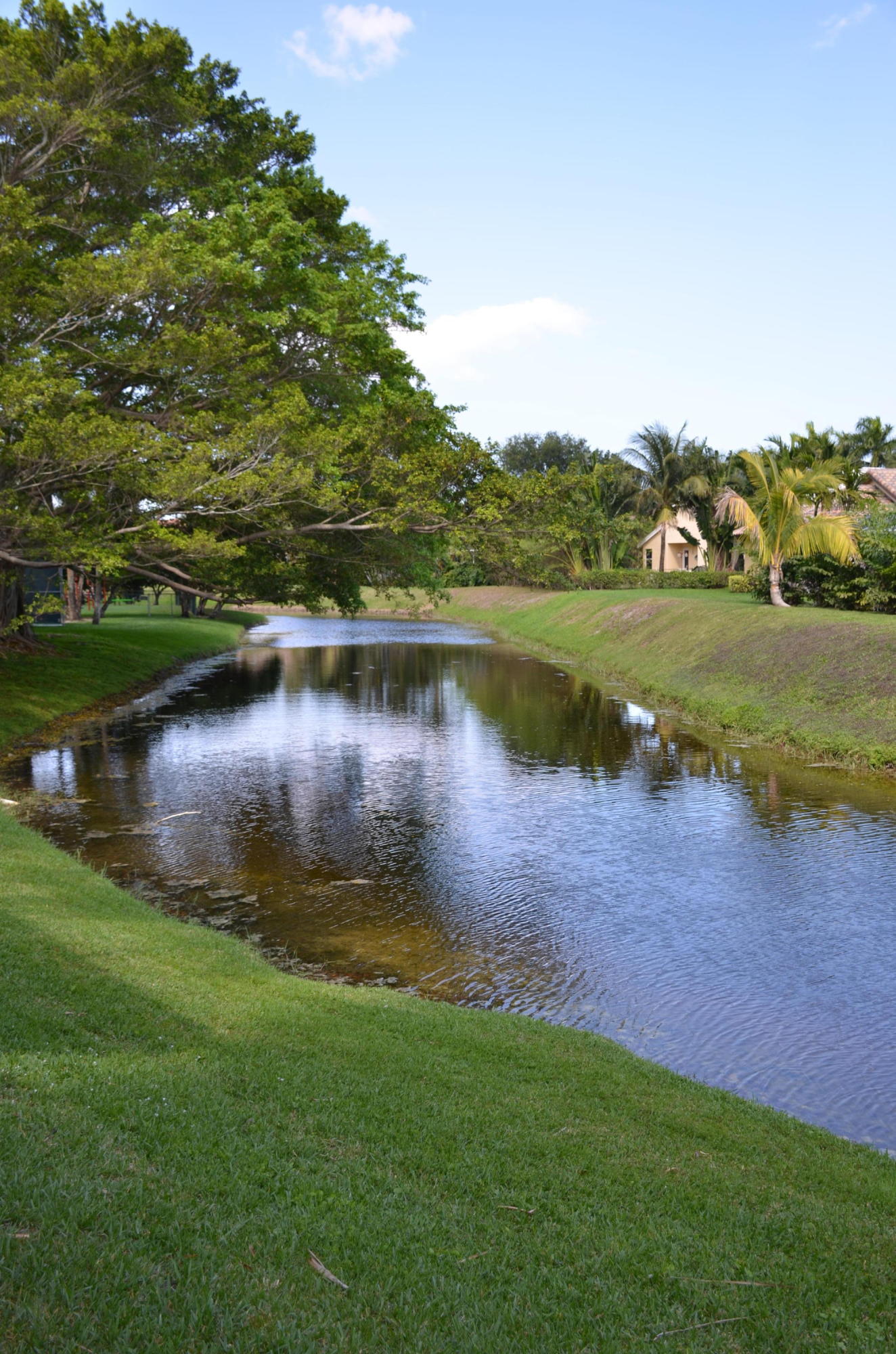 1200 Parkside Avenue Boca Raton, FL 33486 - Photo 12 of 33 a view of a lake with houses in the background
