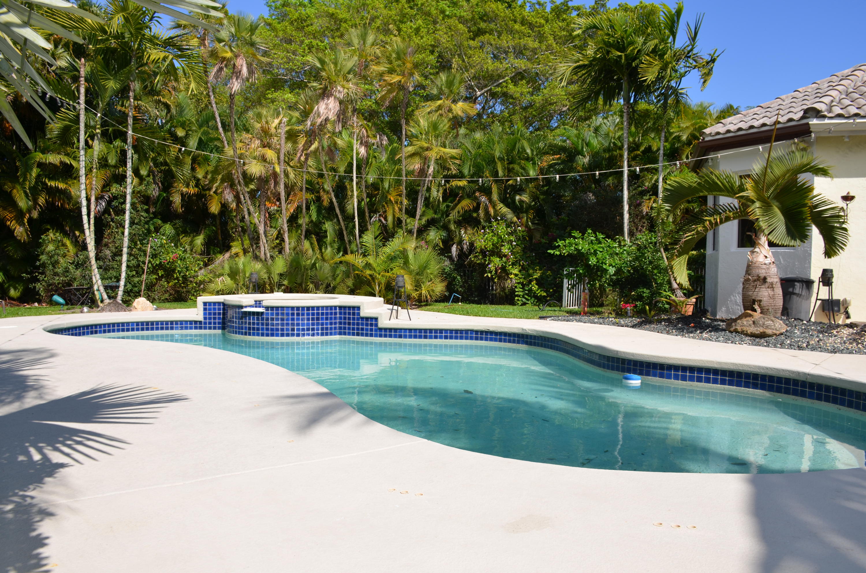 1200 Parkside Avenue Boca Raton, FL 33486 - Photo 7 of 33 a view of swimming pool with a yard
