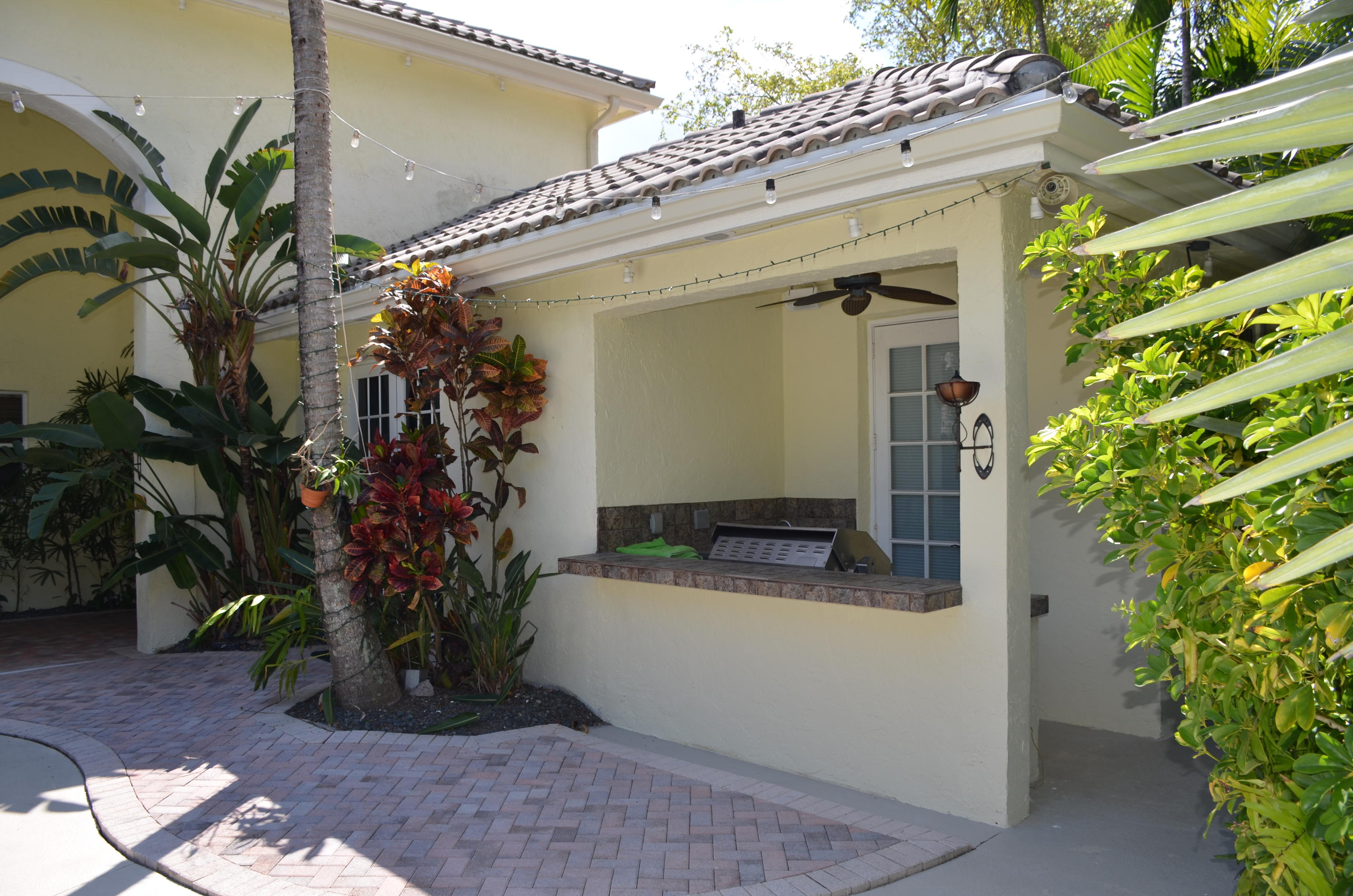 1200 Parkside Avenue Boca Raton, FL 33486 - Photo 9 of 33 a view of house with potted plant