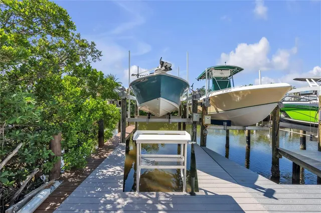 a view of a chairs and table in the patio