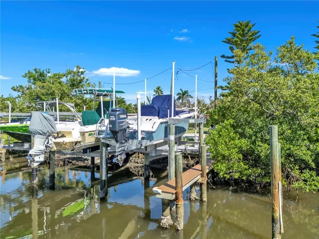 a view of a chairs and table in a patio