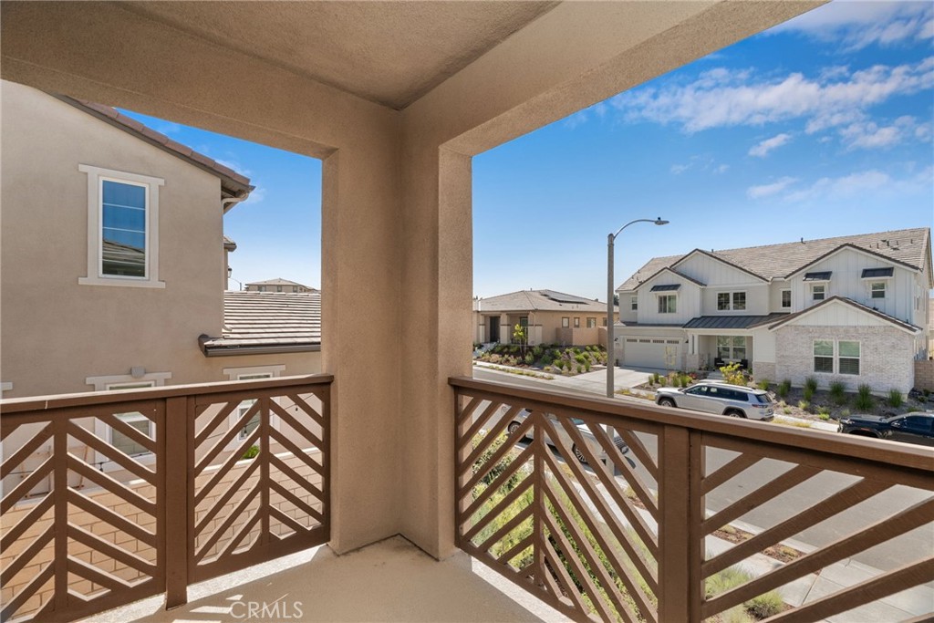 32448 Toyon Road Temecula, CA 92591 - Photo 28 of 72 a view of a living room a bathroom and a front door