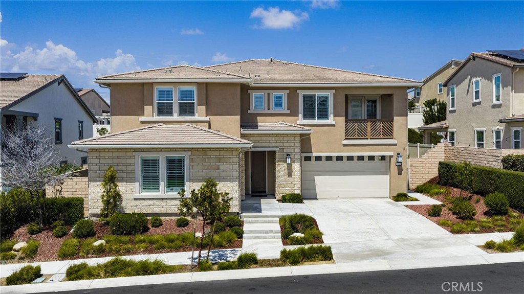32448 Toyon Road Temecula, CA 92591 - Photo 4 of 72 a front view of a house with garden