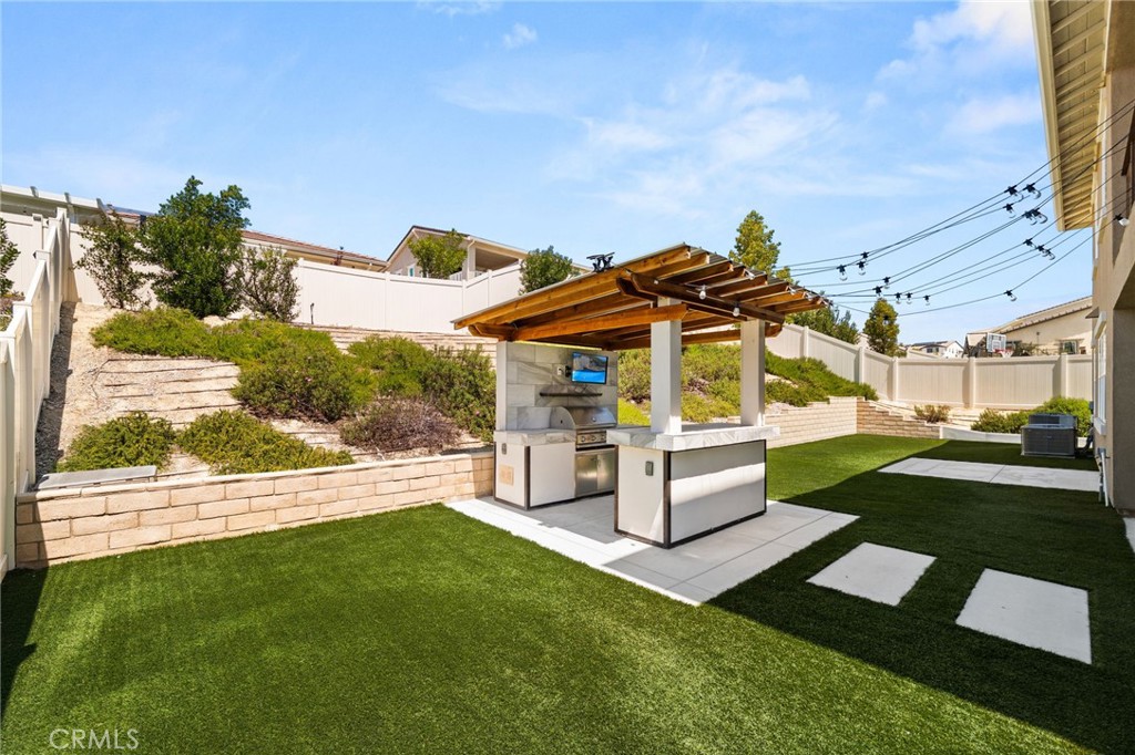 32448 Toyon Road Temecula, CA 92591 - Photo 55 of 72 a view of a house with a yard