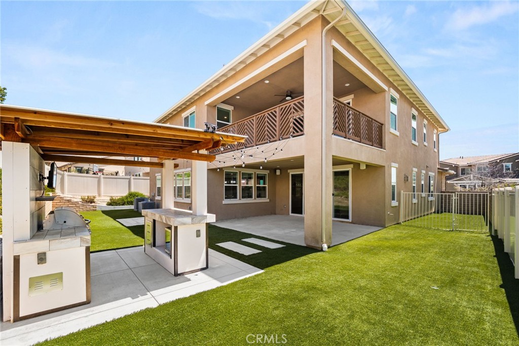 32448 Toyon Road Temecula, CA 92591 - Photo 56 of 72 a view of a house with a backyard and porch