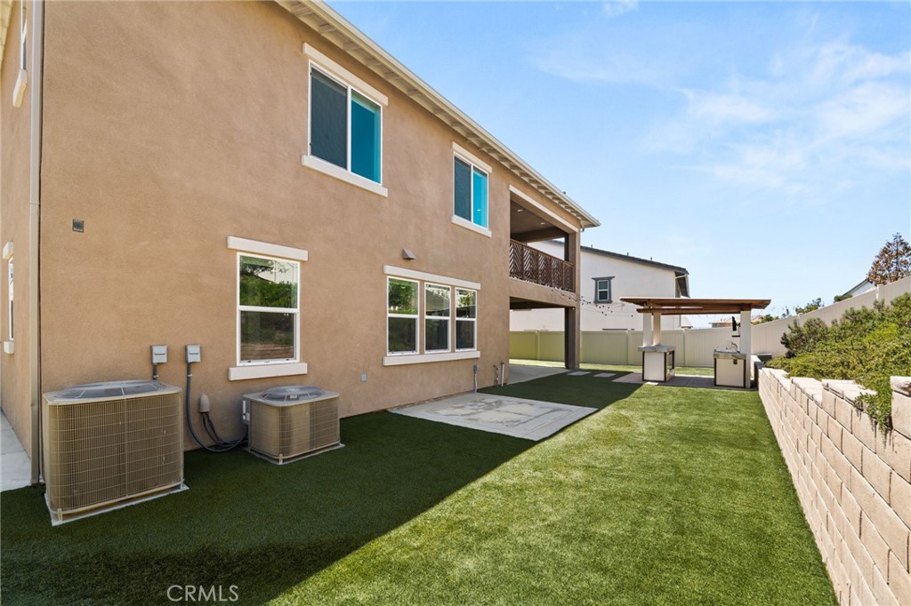 32448 Toyon Road Temecula, CA 92591 - Photo 60 of 72 a front view of a house with a yard