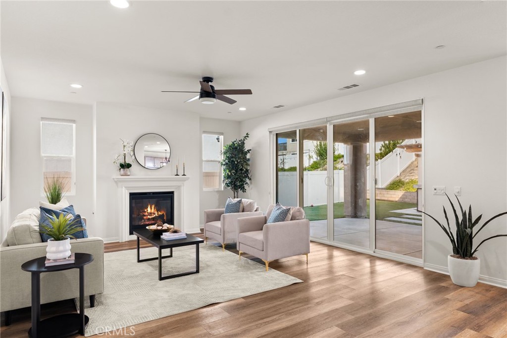 32448 Toyon Road Temecula, CA 92591 - Photo 8 of 72 a living room with furniture and a fireplace