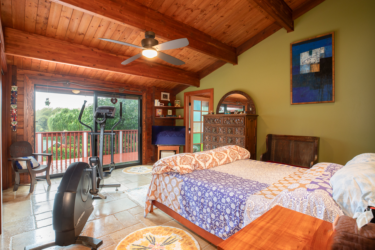 64-5097 White Road, Unit A Kamuela, HI 96743 - Photo 12 of 29 a bedroom with a bed and large windows