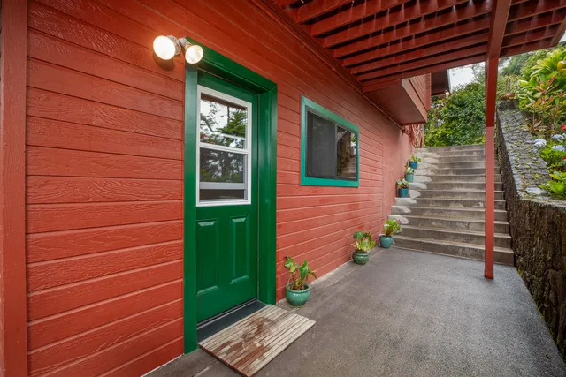a view of outdoor space and front view of a house