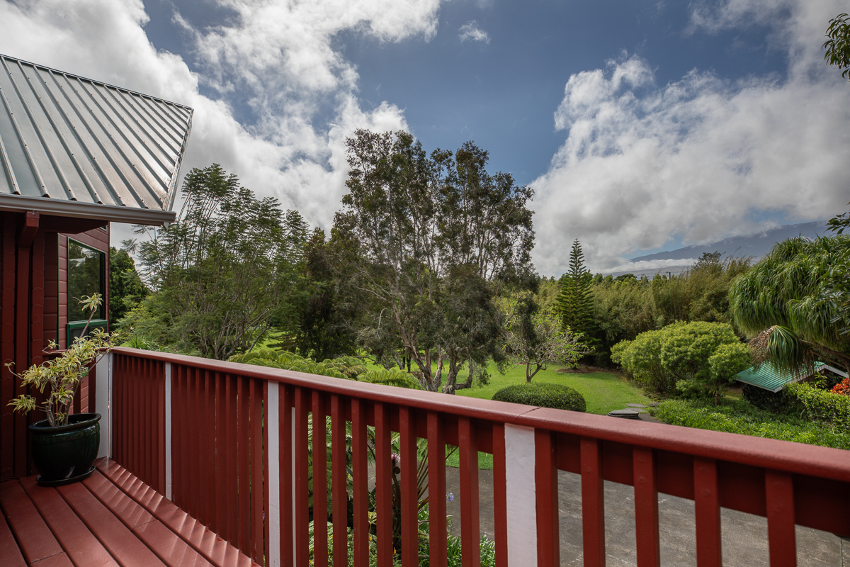 64-5097 White Road, Unit A Kamuela, HI 96743 - Photo 25 of 29 a balcony with wooden floor and outdoor space
