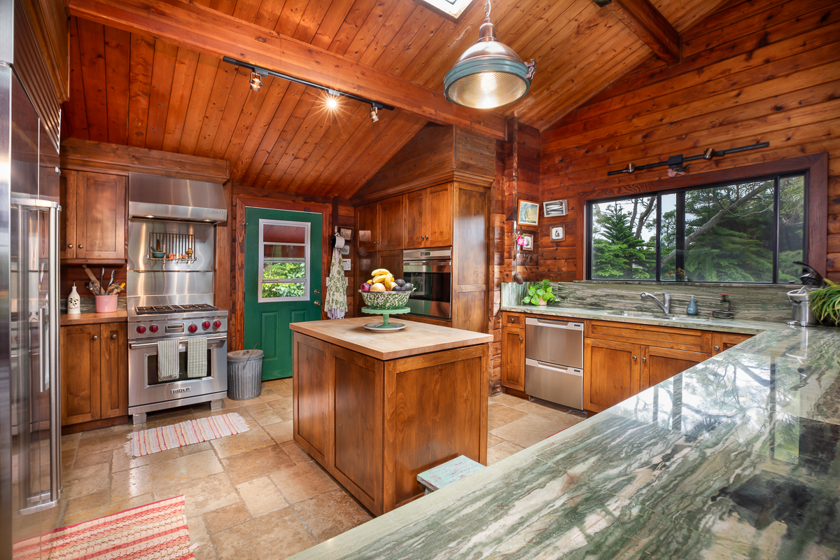 64-5097 White Road, Unit A Kamuela, HI 96743 - Photo 7 of 29 a kitchen with a stove and a refrigerator