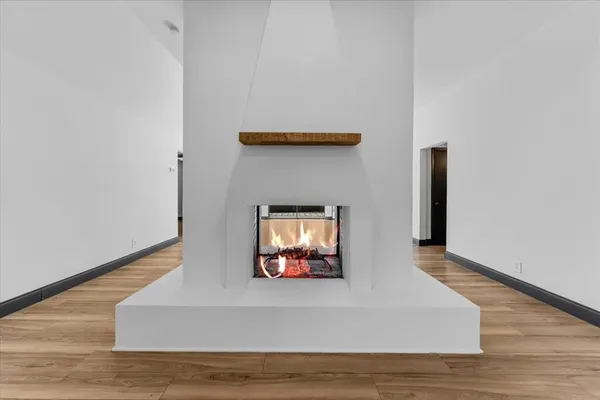 a living room with a fireplace
