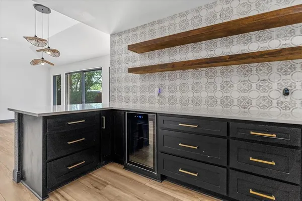 a kitchen with a cabinets and a stove