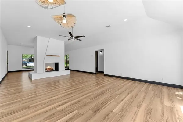a view of a livingroom with wooden floor