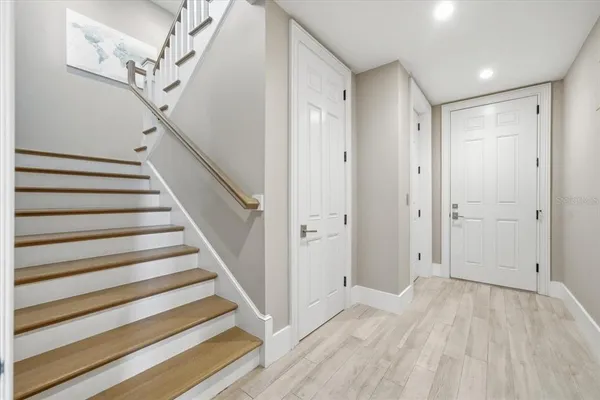 a bathroom with a shower and a sink