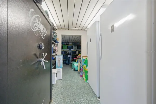 an aerial view of a house with a lake view