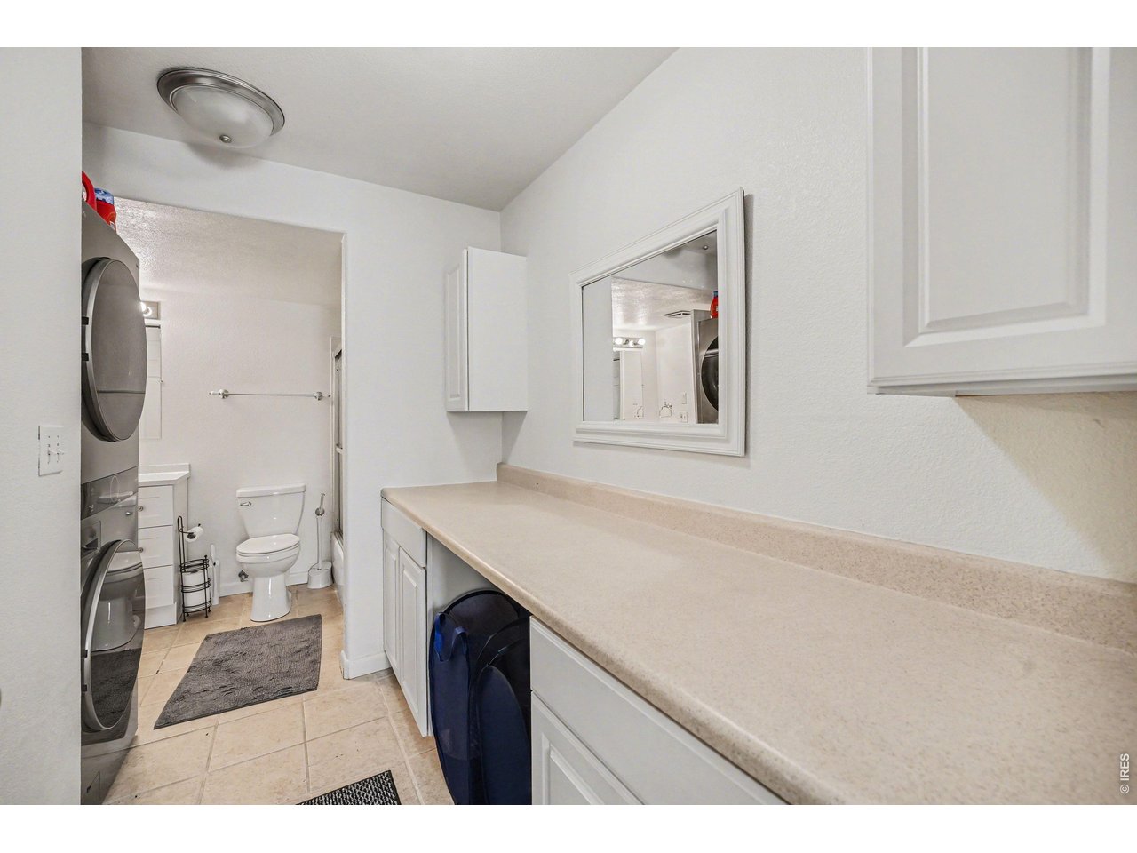 8460 Decatur Street, Unit 128 Westminster, CO 80031 - Photo 23 of 30 Bathroom/Laundry from the primary bedroom