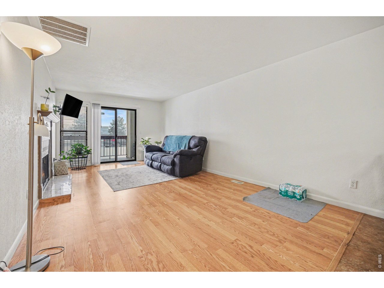 8460 Decatur Street, Unit 128 Westminster, CO 80031 - Photo 7 of 30 Upon walking inside, Looking into living/dining area