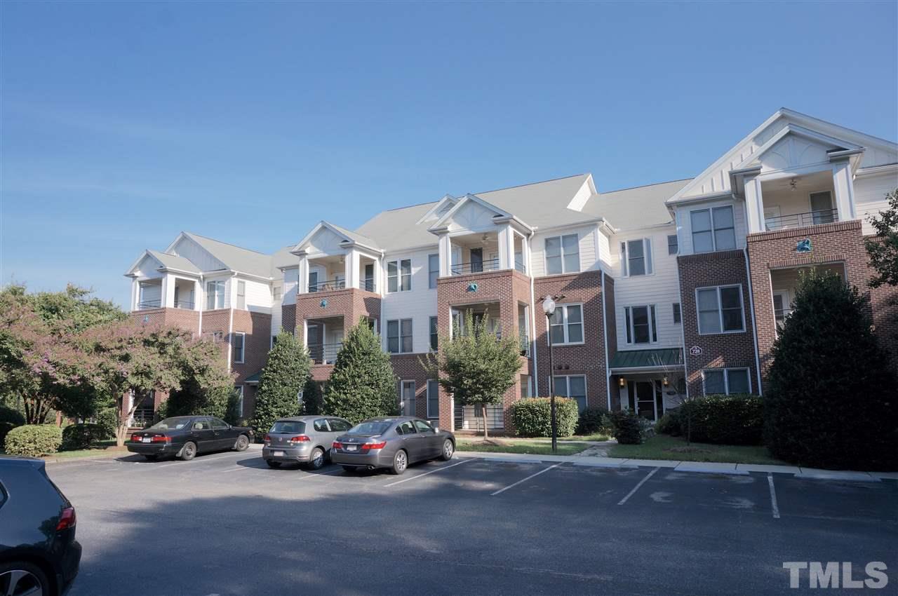 710 North Person Street, Unit 107 Raleigh, NC 27604 - Photo 21 of 21 a view of a street in front of residential houses