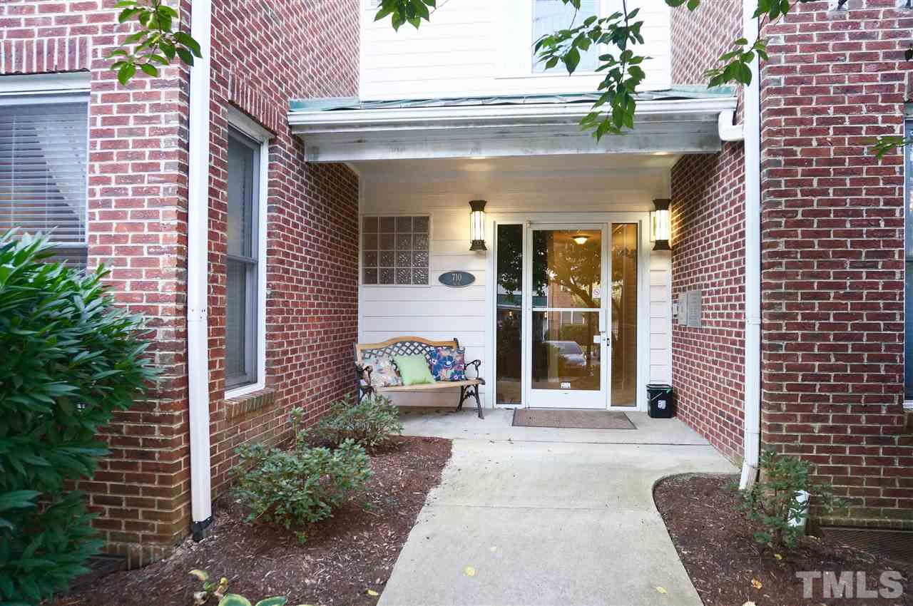 710 North Person Street, Unit 107 Raleigh, NC 27604 - Photo 5 of 21 a front view of a house with a porch