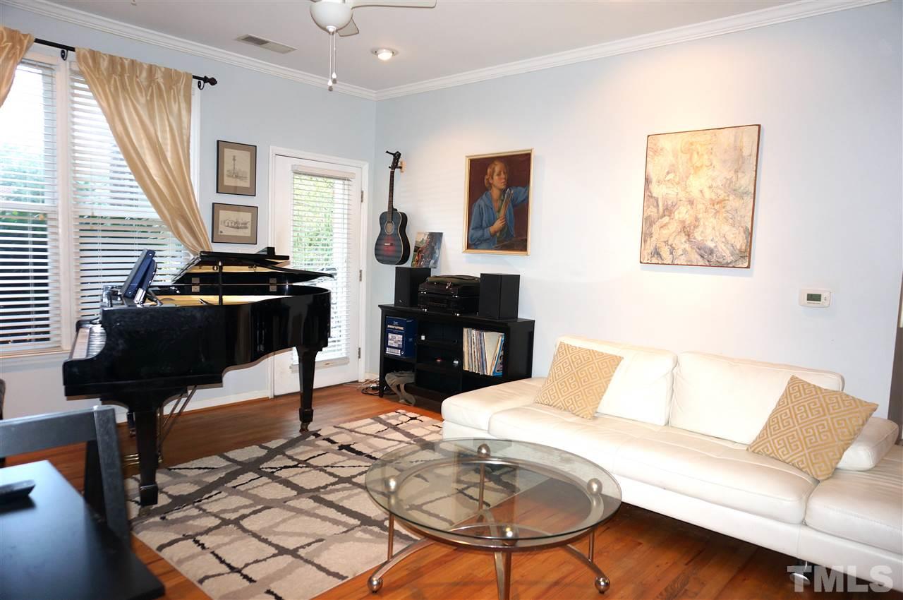 710 North Person Street, Unit 107 Raleigh, NC 27604 - Photo 7 of 21 a living room with furniture