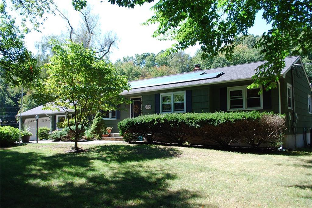 11 Pole Bridge Road Newtown, CT 06482 - Photo 1 of 1 a front view of a house with a yard