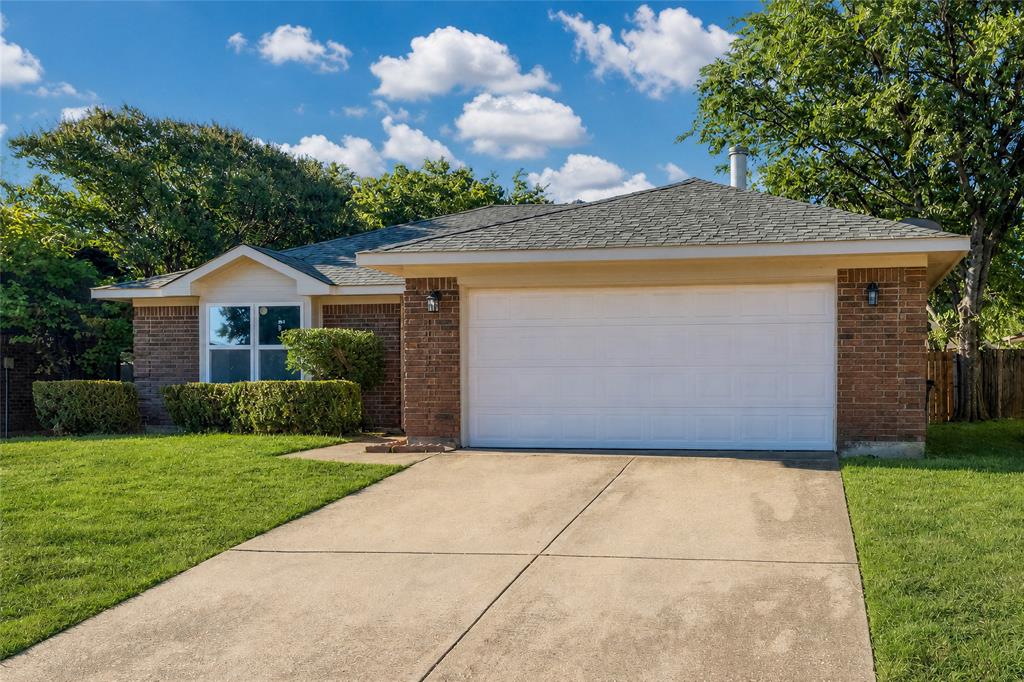2513 Poplar Spring Road Fort Worth, TX 76123 - Photo 2 of 40 Brick exterior with a gabled roof and a two-car garage